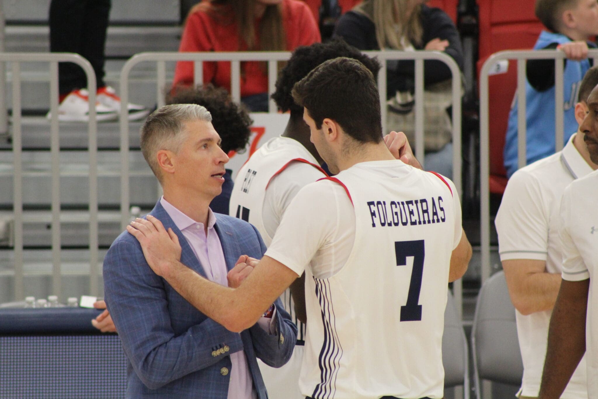 Robert Morris basketball head coach Andy Toole and forward Alvaro Folgueiras