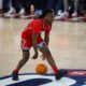 Robert Morris guard Kam Woods dribbles the ball up the court at the UPMC Events Center -- RMU Athletics