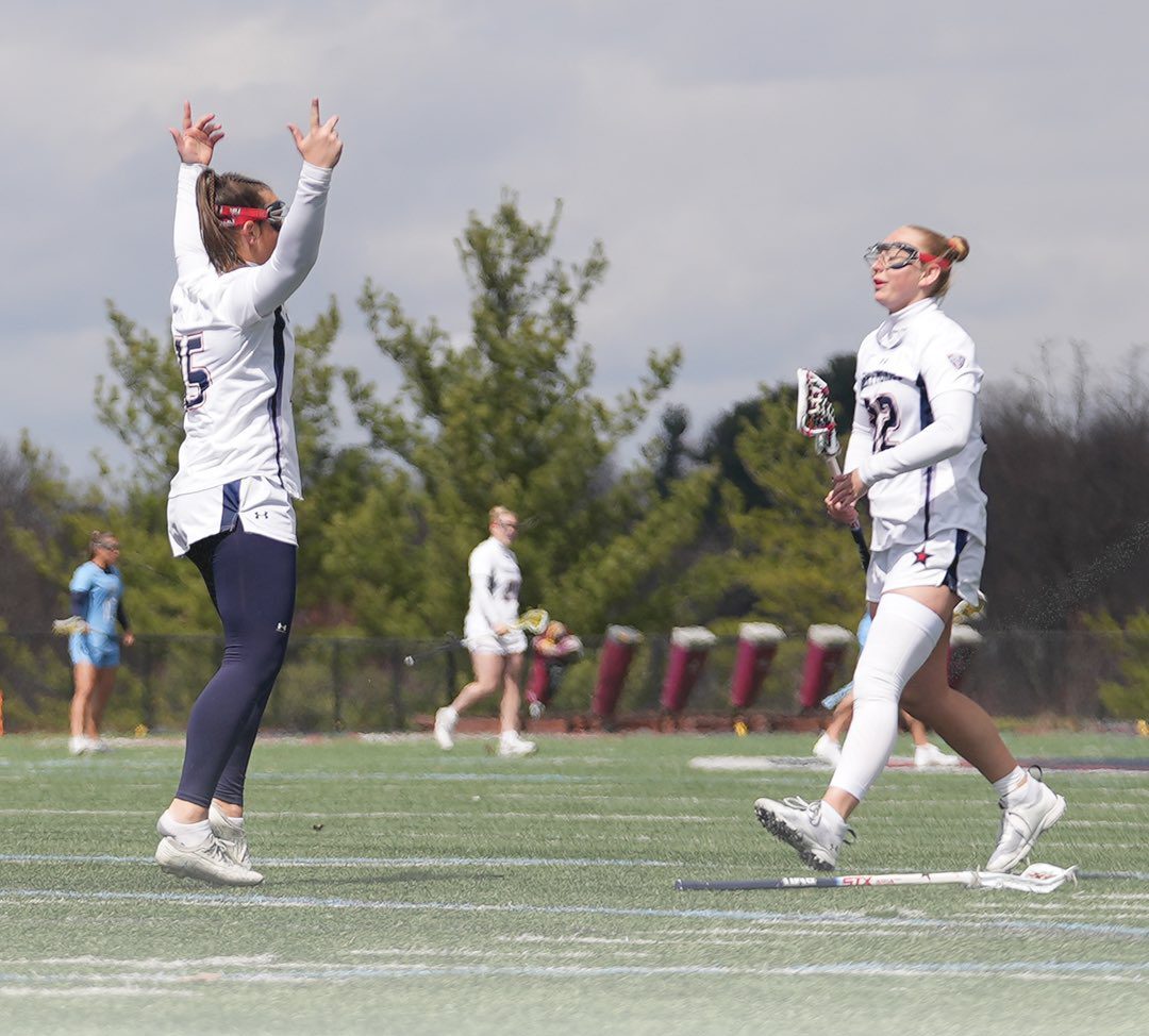 Robert Morris women's lacrosse players celebrate after defeating Old Dominion in overtime -- RMU Athletics