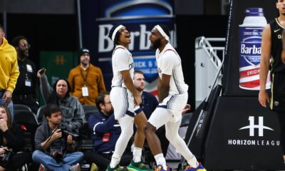Robert Morris forward Amarion Dickerson and guard D.J. Smith celebrate after play against Oakland in Horizon League semifinal matchup -- RMU Athletics