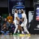 Robert Morris forward Amarion Dickerson and guard D.J. Smith celebrate after play against Oakland in Horizon League semifinal matchup -- RMU Athletics