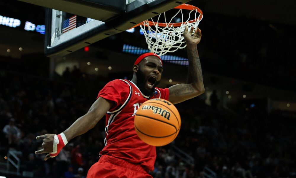 Robert Morris forward Amarion Dickerson dunks against Alabama in the NCAA Tournament -- RMU Athletics