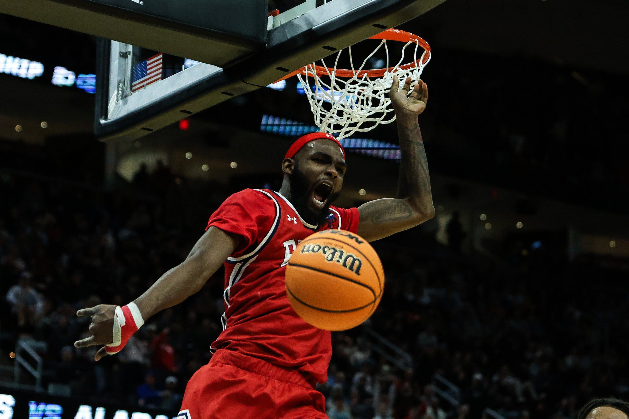 Robert Morris forward Amarion Dickerson dunks against Alabama in the NCAA Tournament -- RMU Athletics