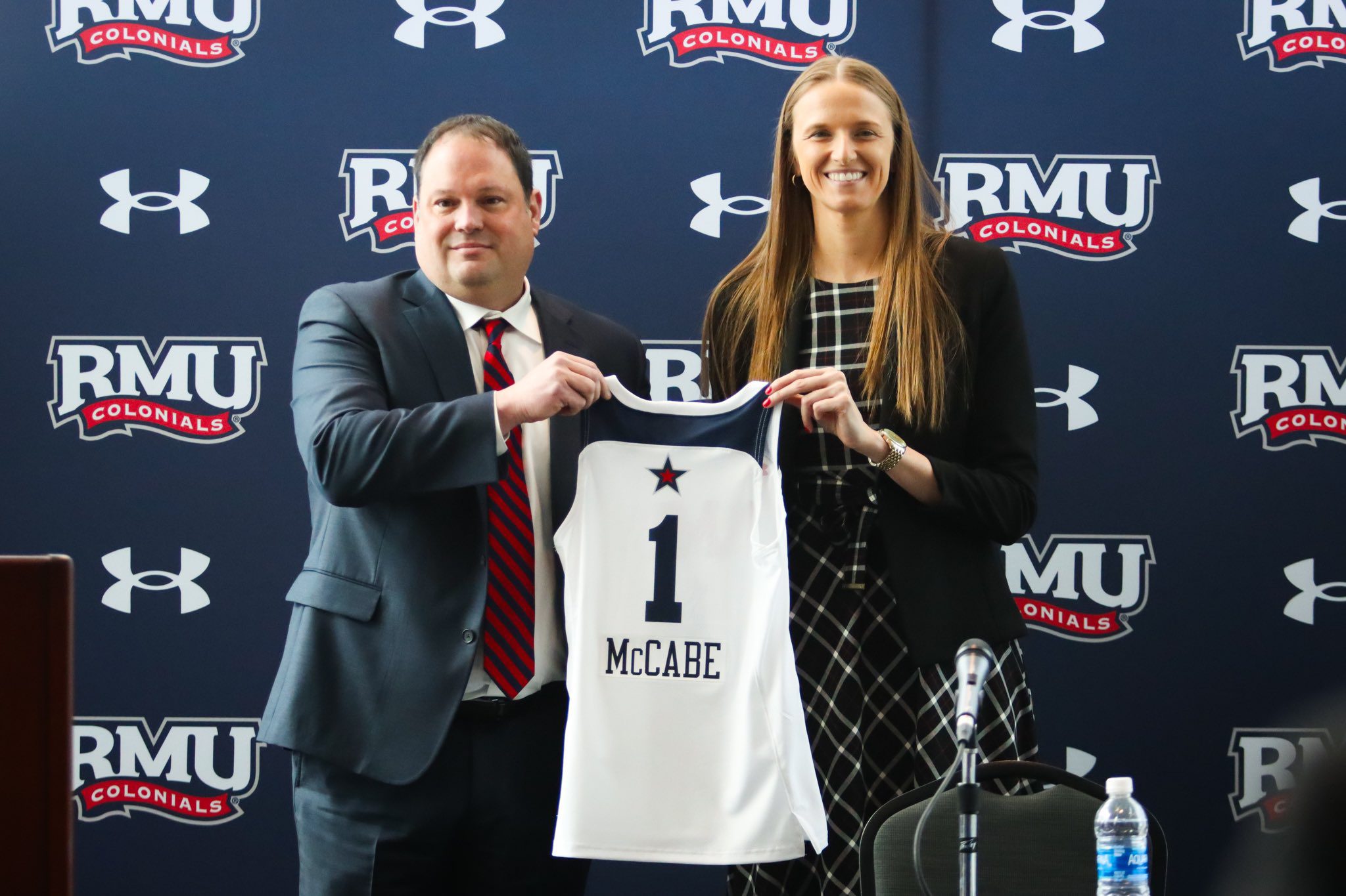 Robert Morris athletic director Chris King and head coach Chandler McCabe -- RMU Athletics