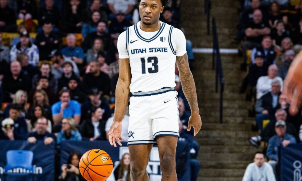 Utah State guard Deyton Albury in a game during the 2024-25 season -- Utah State Athletics