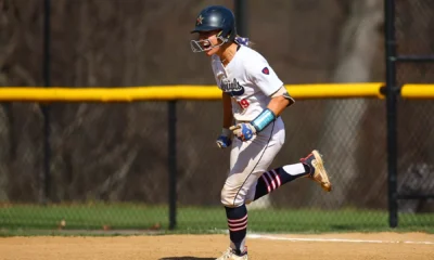 Robert Morris outfielder Courtney Poulich after a home run -- RMU Athletics