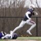 Robert Morris wide receiver Shawn Charles runs towards the end zone in a game against Stonehill during the 2024 season -- RMU Athletics