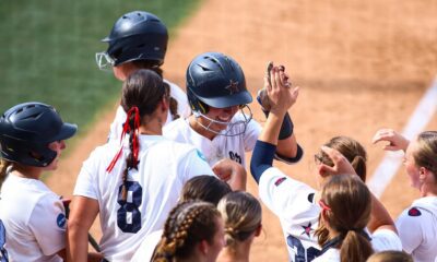 Robert Morris softball celebrates a home run against Auburn in the NCAA Tournament regionals -- RMU Athletics