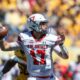 Robert Morris quarterback Zach Tanner attempts a pass against West Virginia on Aug. 30, 2025 -- William Wotring / West Virginia Sports Now