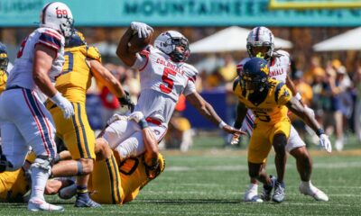 Robert Morris running back Donta Whack is tackled during a game against West Virginia on Aug. 30, 2025 -- William Wotring / West Virginia Sports Now