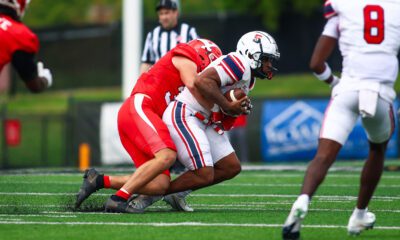 Robert Morris running back Donta Whack is tackled during a game against Youngstown St. on Sept. 6, 2025 -- RMU Athletics