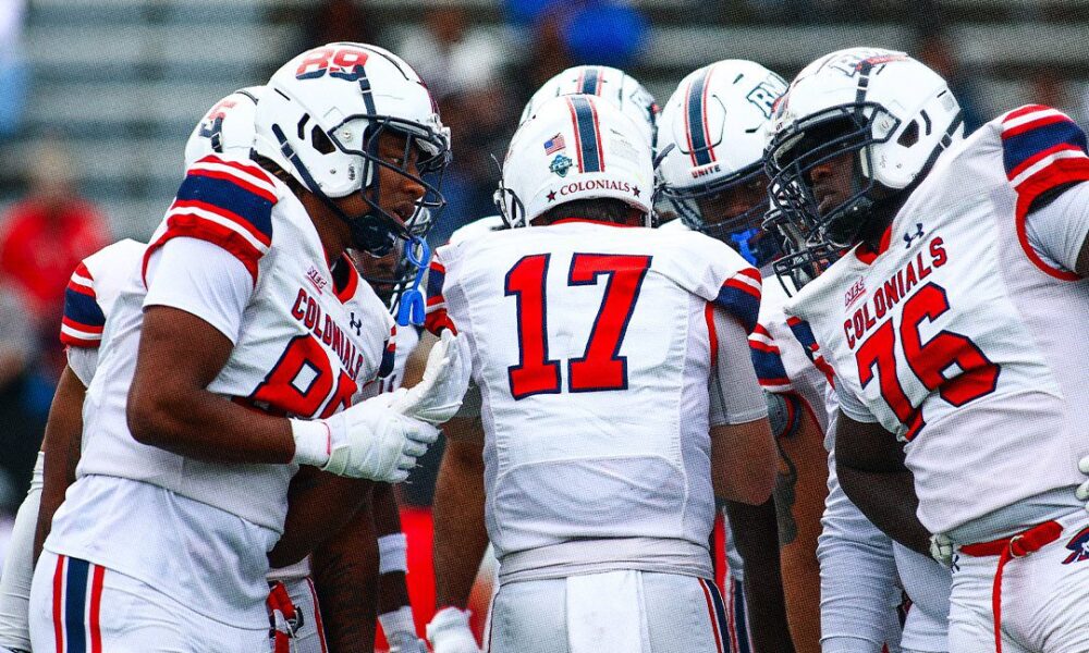 Robert Morris quarterback Zach Tanner inside of the huddle -- RMU Athletics