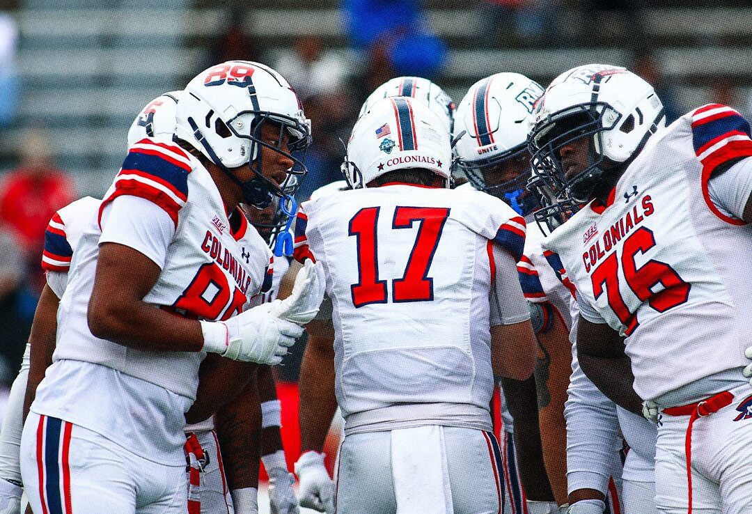 Robert Morris quarterback Zach Tanner inside of the huddle -- RMU Athletics