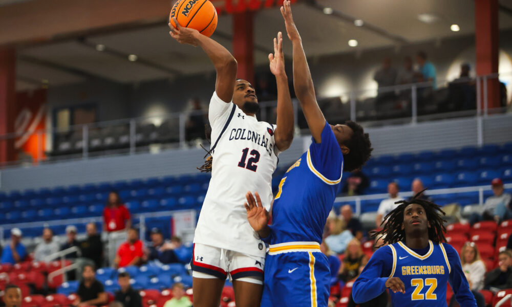 Robert Morris guard Darius Livingston goes up for a shot against a Pitt-Greensburg defender on Nov. 13, 2025 -- RMU Athletics