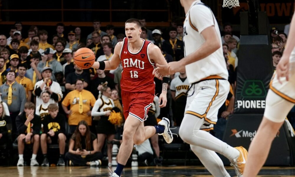 Robert Morris forward Nikolaos Chitikoudis brings the ball up court in front of former Robert Morris, current Iowa forward Alvaro Folgueiras on Nov. 4, 2025 -- RMU Athletics