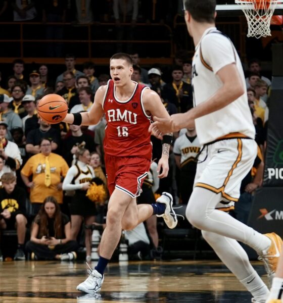 Robert Morris forward Nikolaos Chitikoudis brings the ball up court in front of former Robert Morris, current Iowa forward Alvaro Folgueiras on Nov. 4, 2025 -- RMU Athletics