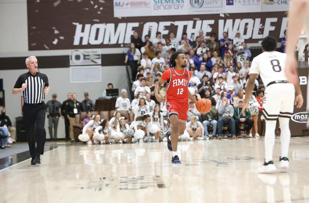 Robert Morris guard Darius Livingston brings the ball up the court against a St. Bonaventure defender on Nov. 21, 2025 -- RMU Athletics