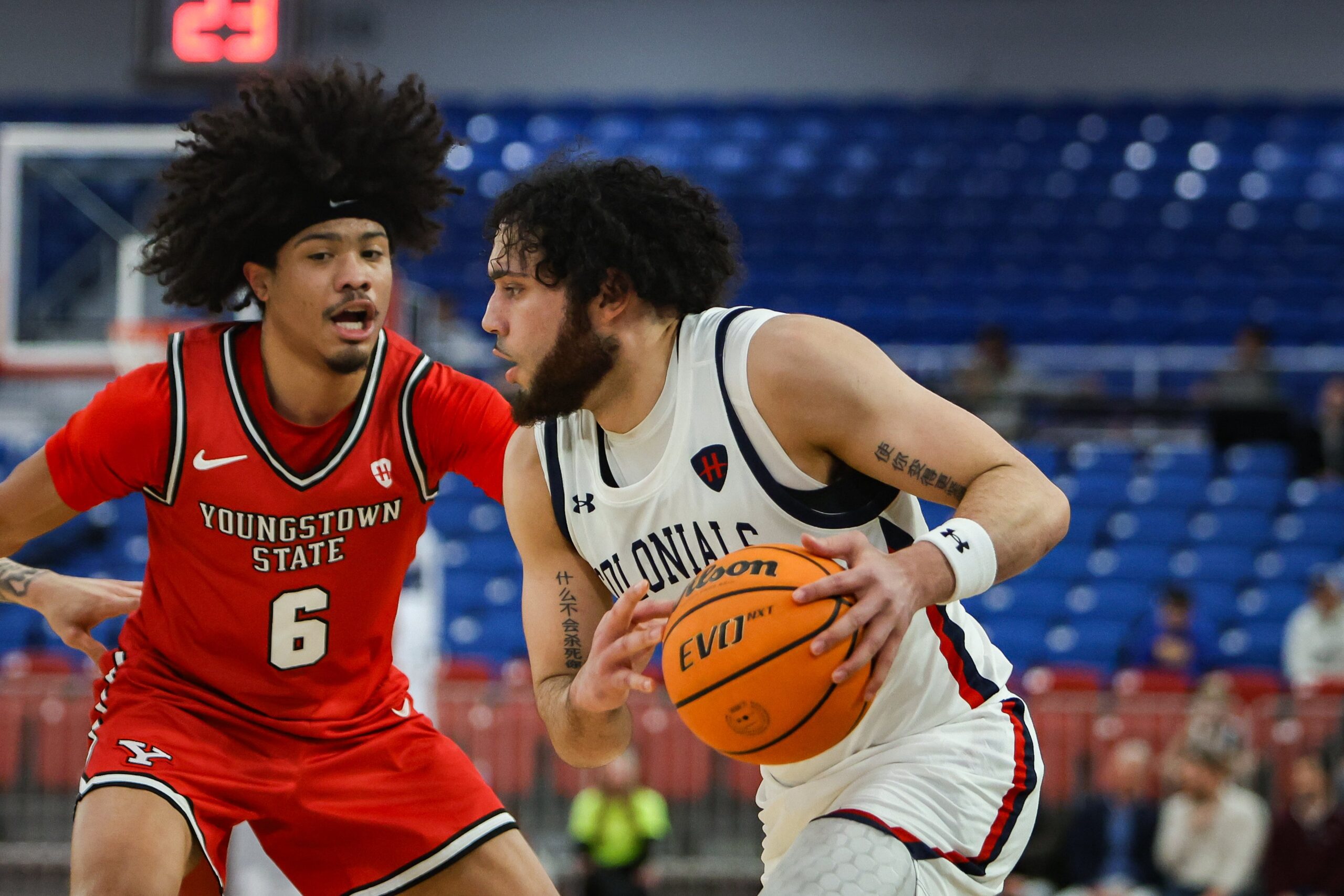 Robert Morris wing Ryan Prather Jr. looks to drive the ball against a Youngstown St. defender on Dec. 17, 2025 -- RMU Athletics