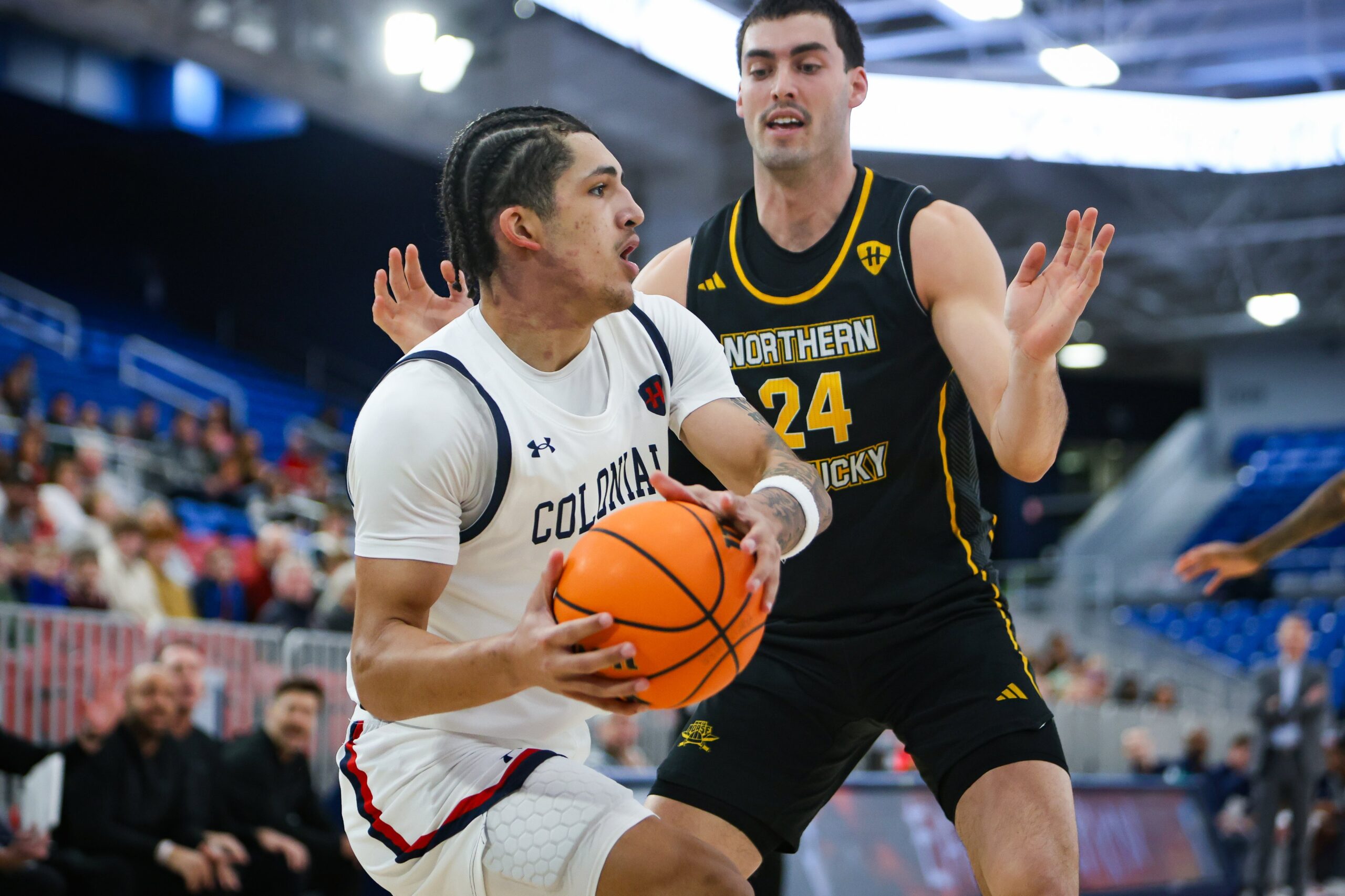 Robert Morris forward DeSean Goode is guarded by Norther Kentucky forward Kael Robinson on Dec. 29, 2025 -- RMU Athletics