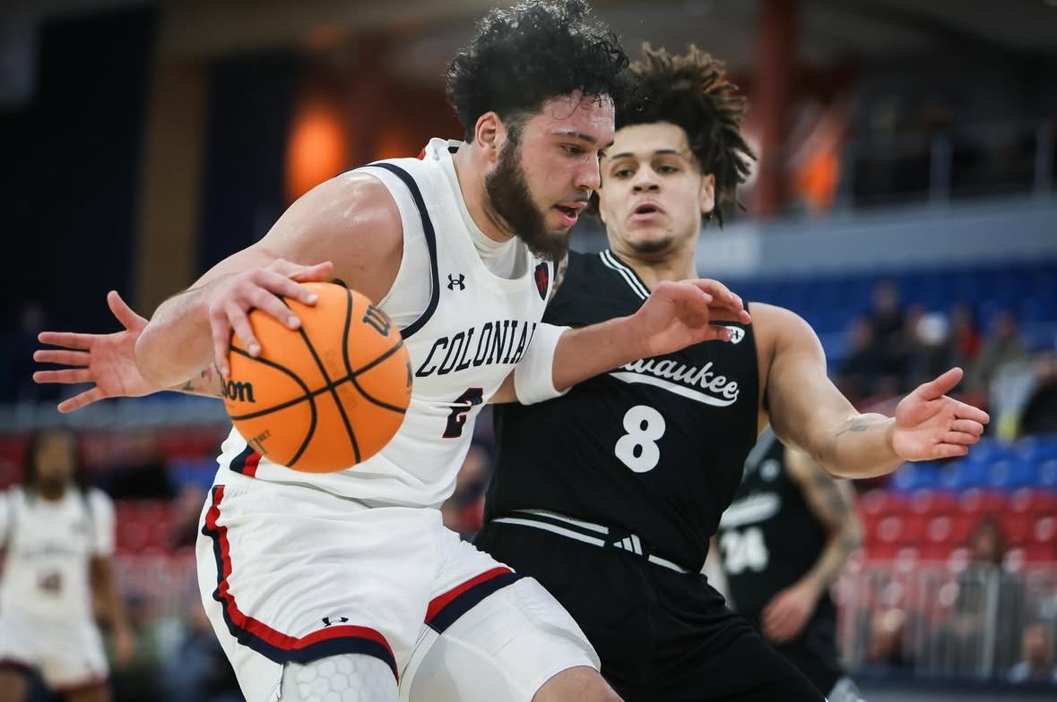 Robert Morris winger Ryan Prather Jr. drives against a Milwaukee defender on Jan. 22, 2026 -- RMU Athletics