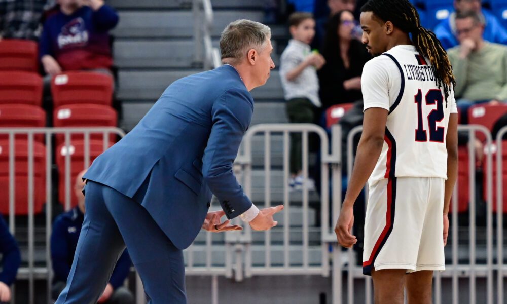 Robert Morris HC Andy Toole coaches up Darius Livingston Jr. during a game against Detroit Mercy on Feb. 25, 2026 -- Ed Thompson // Pittsburgh Sports Now