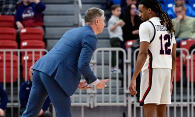 Robert Morris HC Andy Toole coaches up Darius Livingston Jr. during a game against Detroit Mercy on Feb. 25, 2026 -- Ed Thompson // Pittsburgh Sports Now