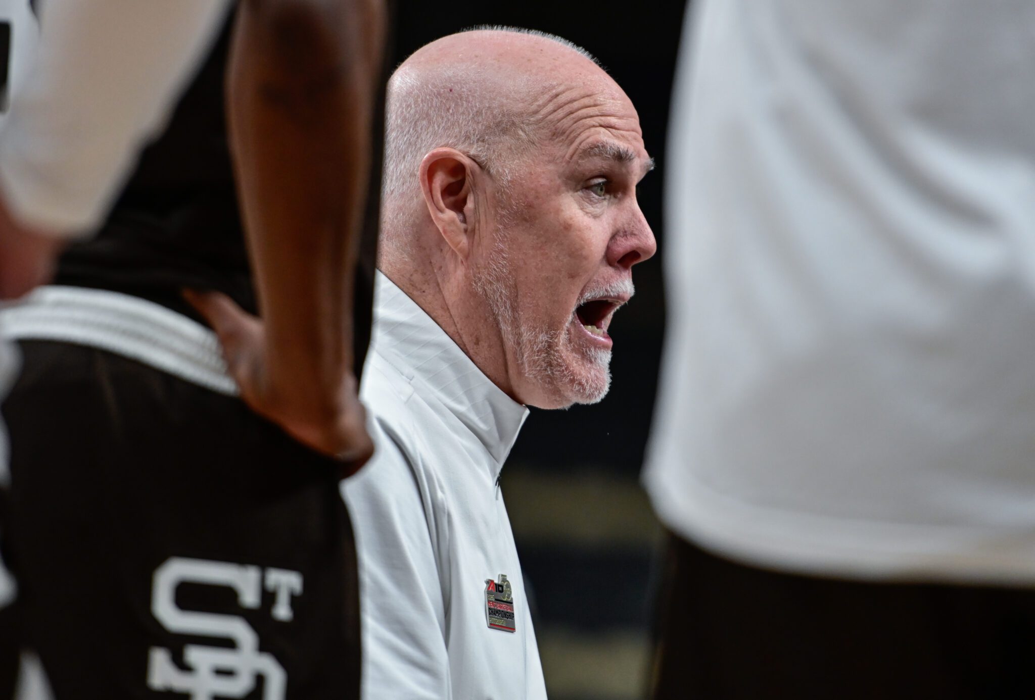 Former St. Bonaventure and Robert Morris head coach Mark Schmidt during the A-10 Tournament at the PPG Paints Arena -- Ed Thompson // Pittsburgh Sports Now