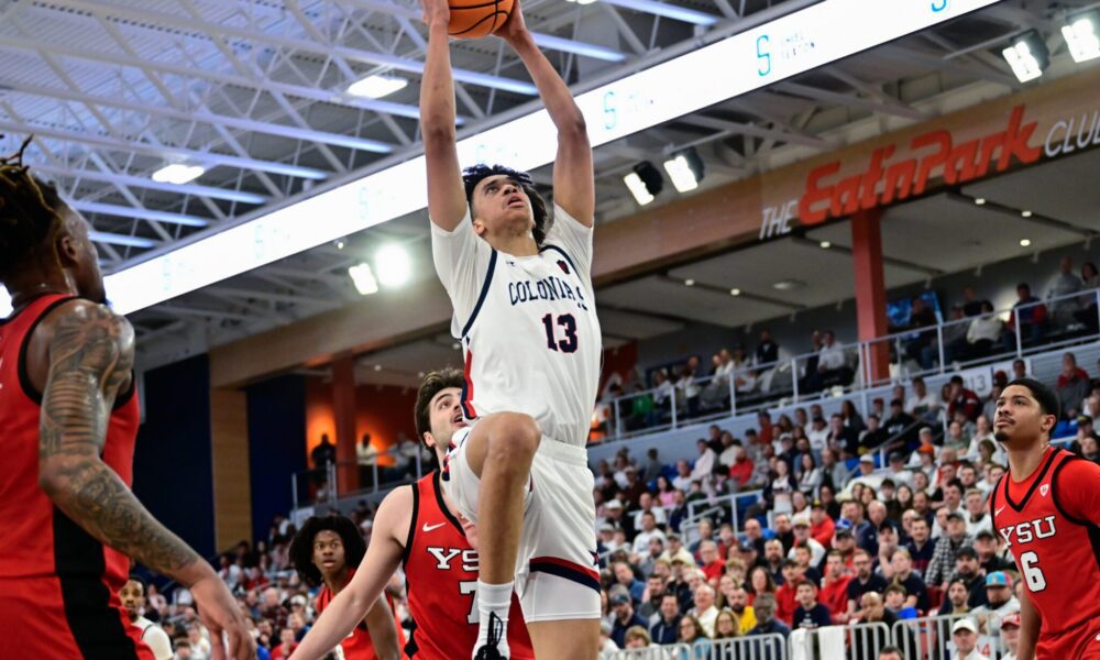 Robert Morris forward Samuel Obenjo throws down a dunk during the Horizon League quarterfinal matchup against Youngstown State — Ed Thompson // Pittsburgh Sports Now