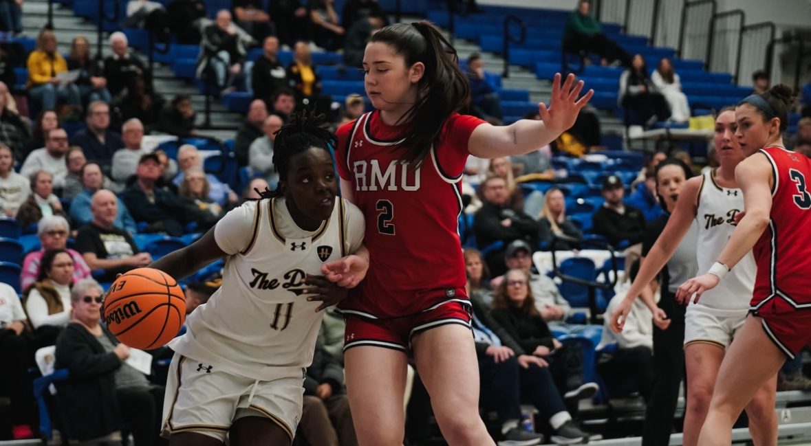 Robert Morris guard Aislin Malcolm defends against a Purdue Fort-Wayne drive during the opening round of the 2026 Horizon League Tournament on March 4, 2026 -- Photo Courtesy of RMU Athletics