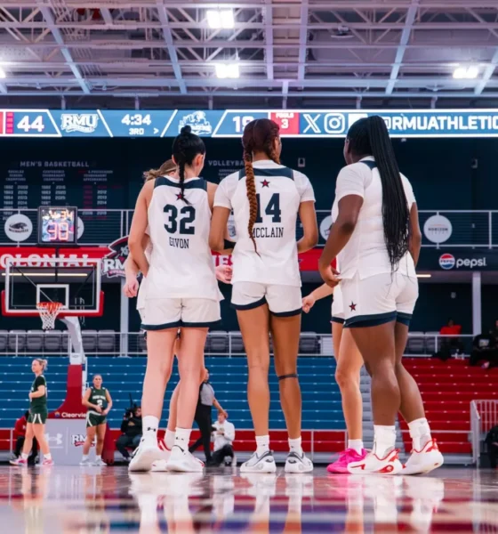 Robert Morris guards Noa Givon and Dania McClain, along with forward Layke Fields, huddle up during a game -- RMU Athletics