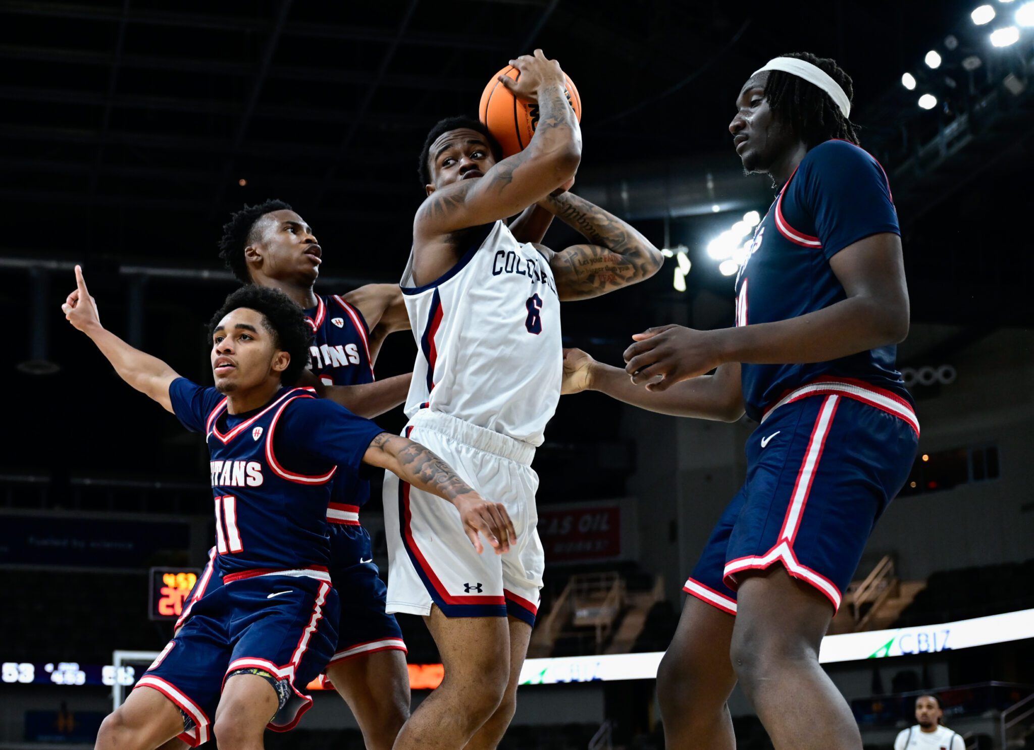 Robert Morris wing Eddie Cooke III hauls in a rebound against Detroit Mercy in the Horizon League semifinals -- Ed Thompson // Pittsburgh Sports Now