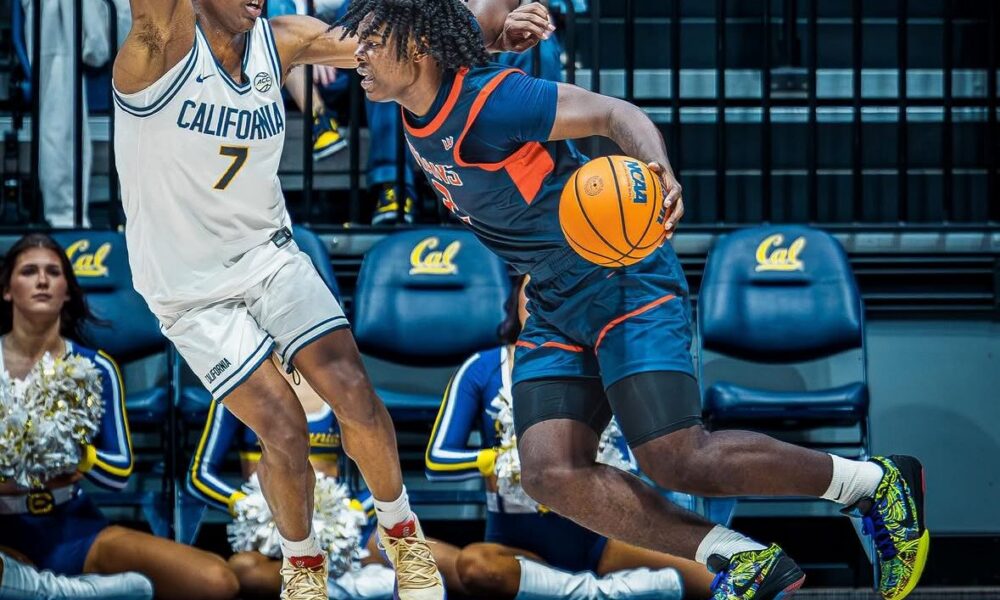Cal Fullerton transfer guard Kiwane Garris Jr. drives against a Cal defender in a game during the 2025-26 season -- Photo courtesy of Garris' Instagram