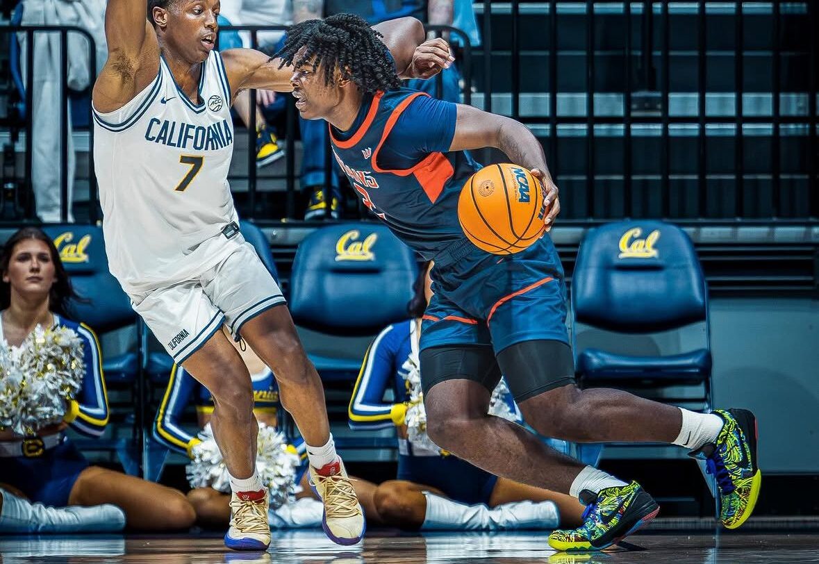 Cal Fullerton transfer guard Kiwane Garris Jr. drives against a Cal defender in a game during the 2025-26 season -- Photo courtesy of Garris' Instagram
