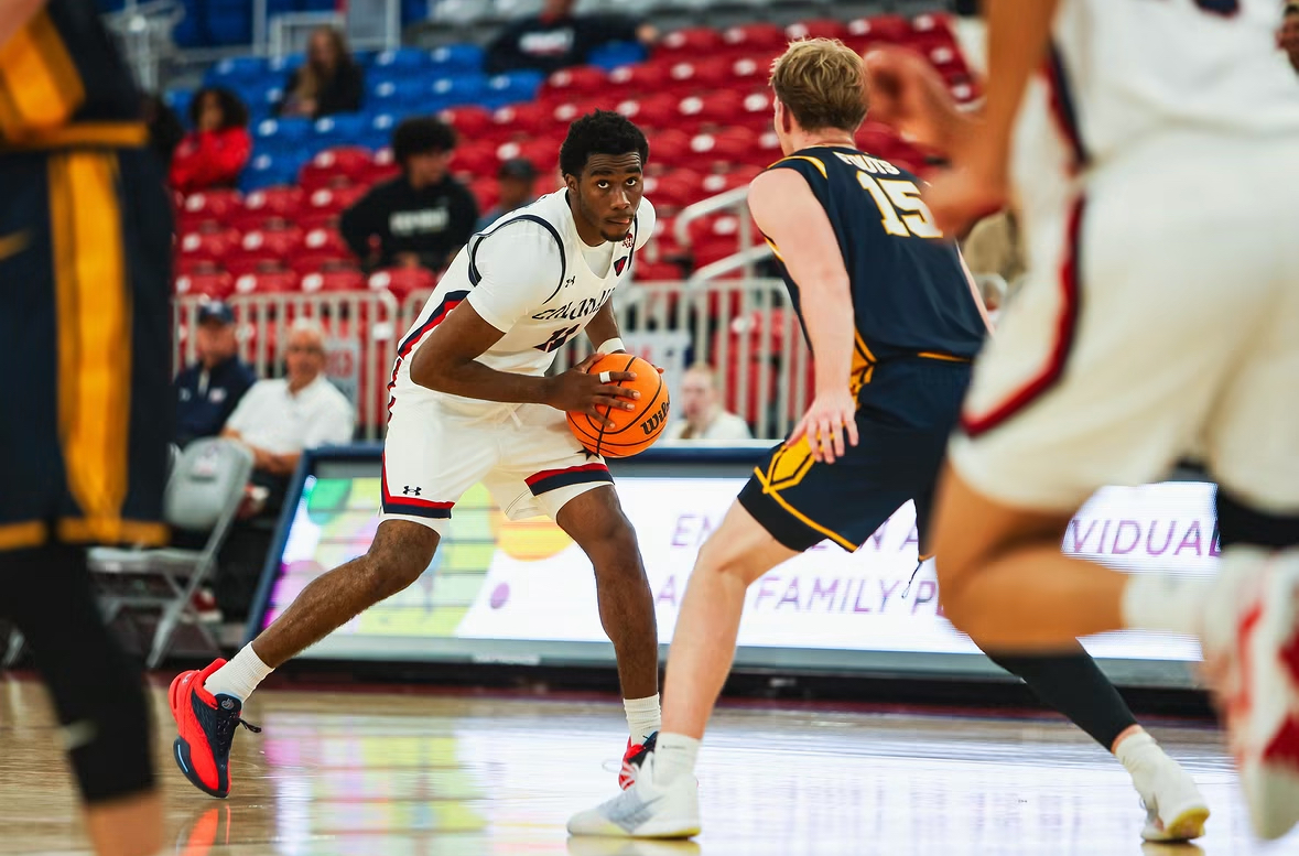 Robert Morris forward Jalik Dunkley eyes up a Canisius defender in the Colonials' exhibition on Oct. 27, 2026 -- Photo Courtesy of RMU Athletics