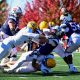 Robert Morris quarterback Carson Haggard tackled as he attempts a pass against New Haven on Oct. 17, 2026 -- Ed Thompson // Pittsburgh Sports Now